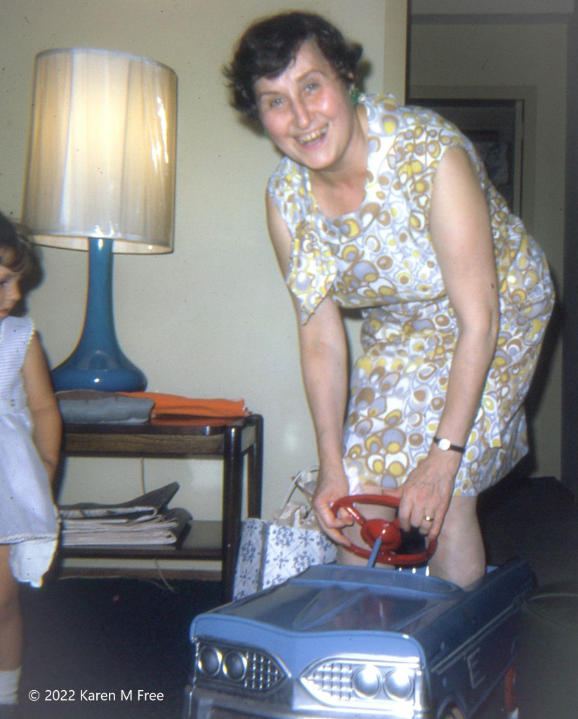 Grandma in toy pedal car