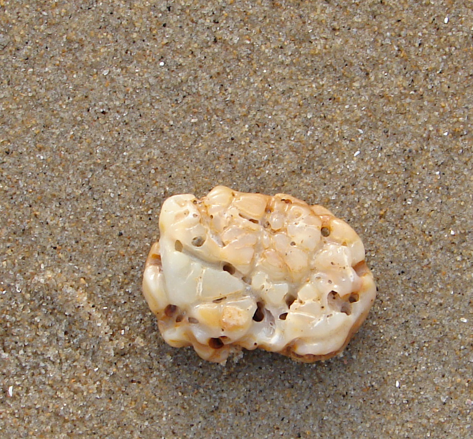 rock with cracks and holes